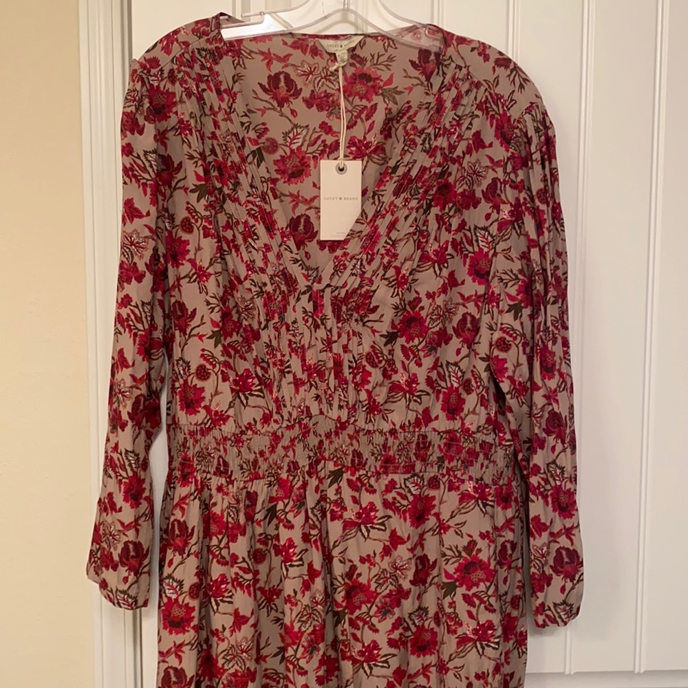 Lucky brand dress. Floral with pin tuck details around v neck.